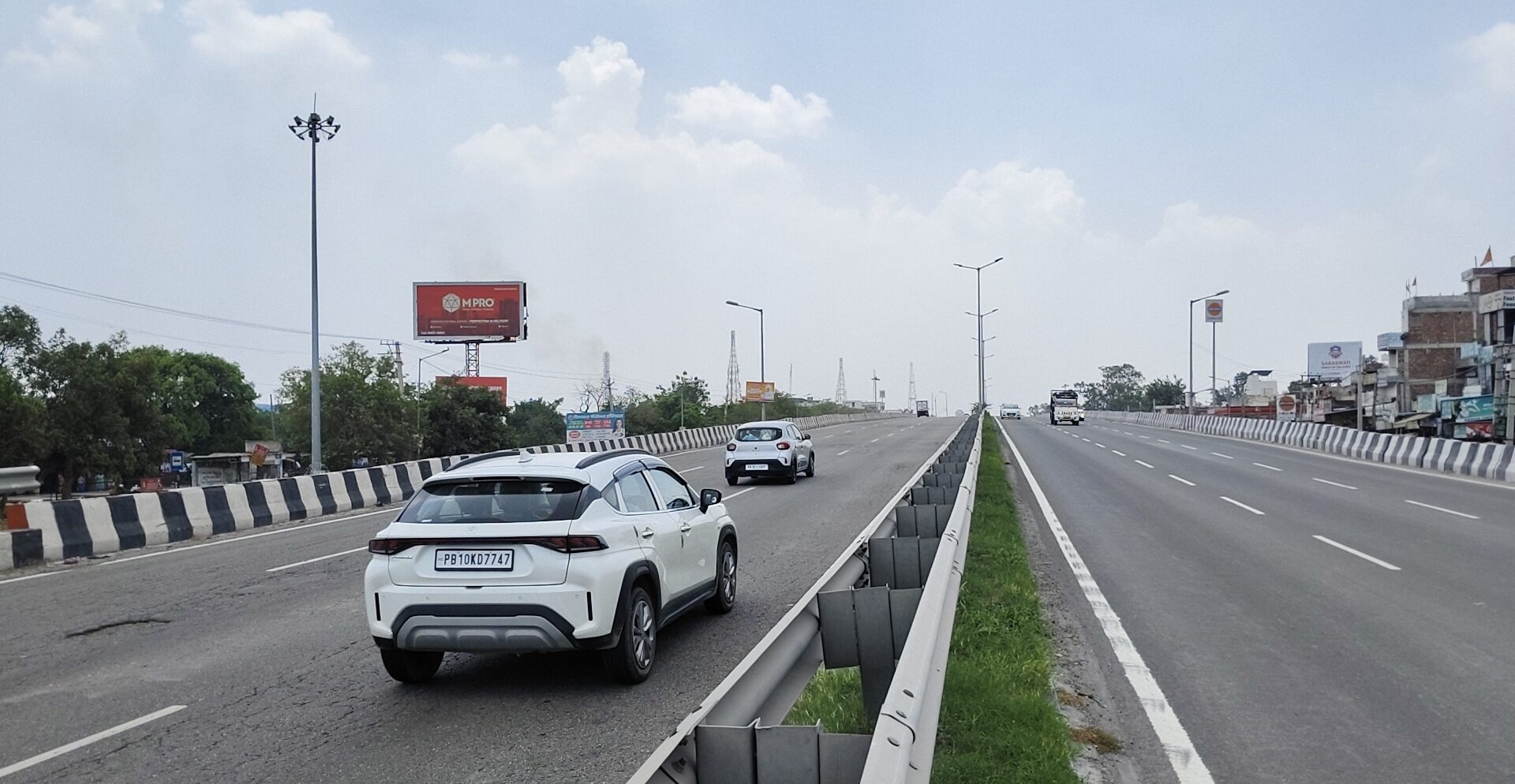 Unipole beside a divided highway